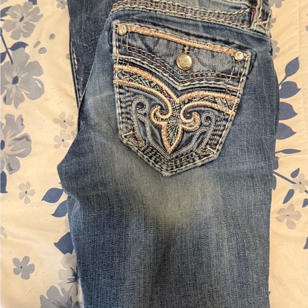 Rock Revival Blue Boot Cut Jeans with Ornate Design